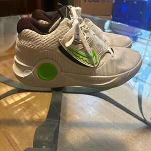 Nike Athletic Shoes with Green Accents